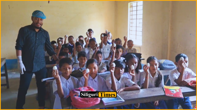 Rajganj BDO distributes boiled eggs to schoolchildren as part of nutrition initiative
