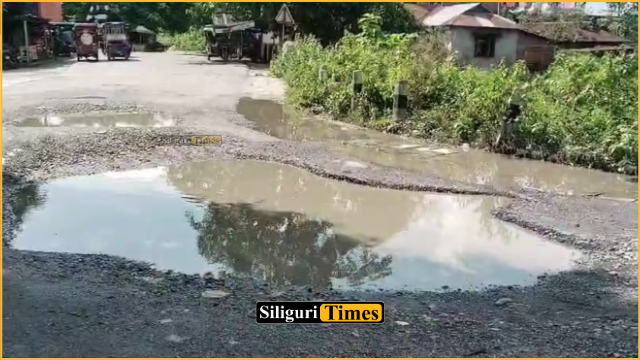 Dilapidated road near Ambari rail gate in Rajganj poses risk to commuters, residents seek urgent repairs