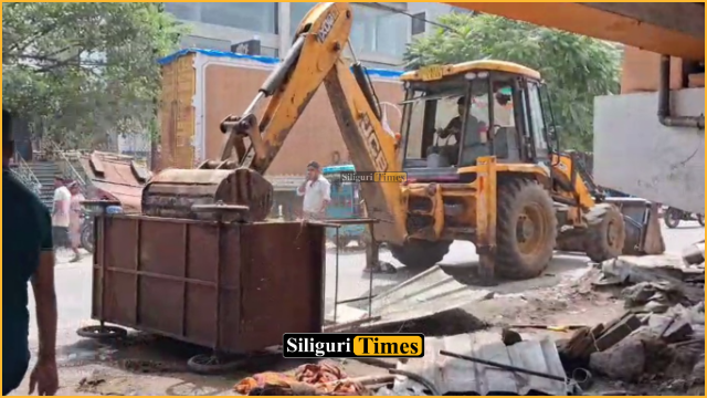 SMC demolishes illegal encroachments under flyover on Burdwan Road in Siliguri