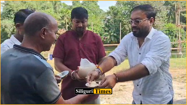 Jalpaiguri Municipality administrator visits immersion ghats, offers sweets to sanitation workers and extends Vijaya Dashami greetings